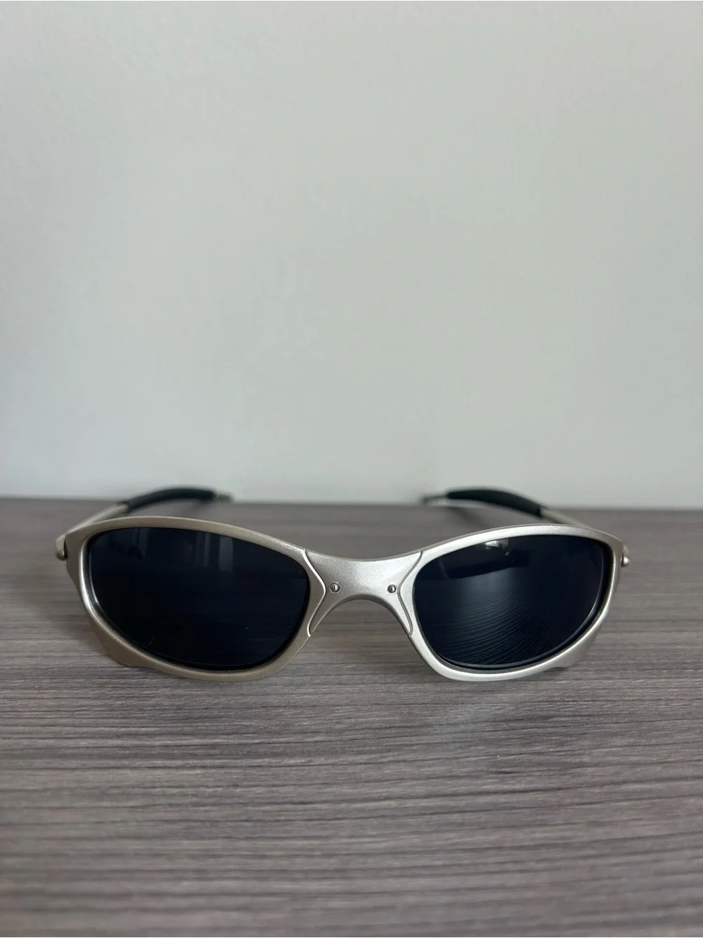 Oakley Men's Silver Frame Sunglasses with Black Lenses